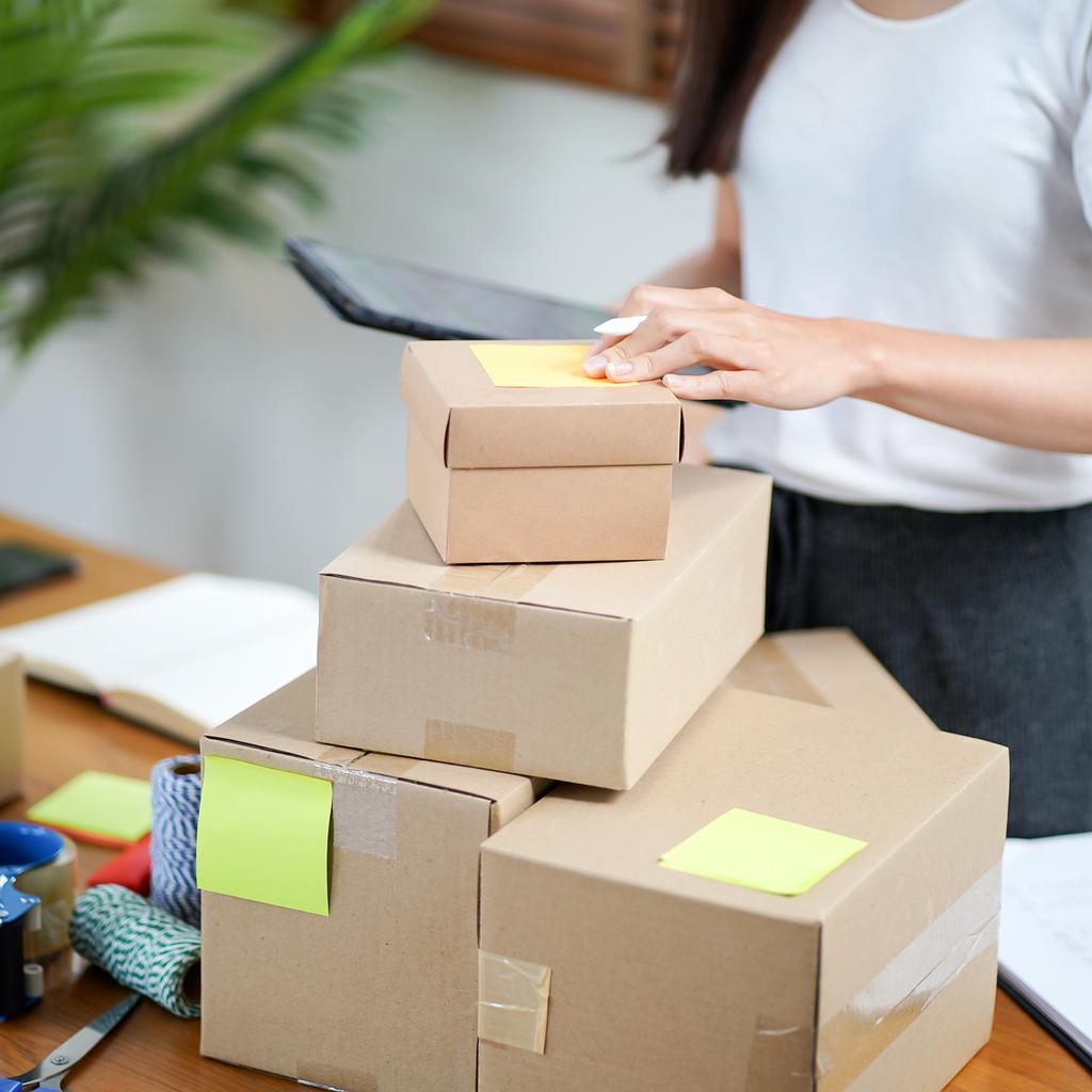 Professional smiling while using an organized email dashboard